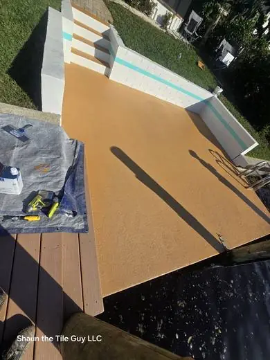 Dock-side deck resurfaced with a textured coating