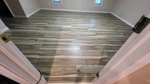 Bold wood-look plank floor with a glossy finish