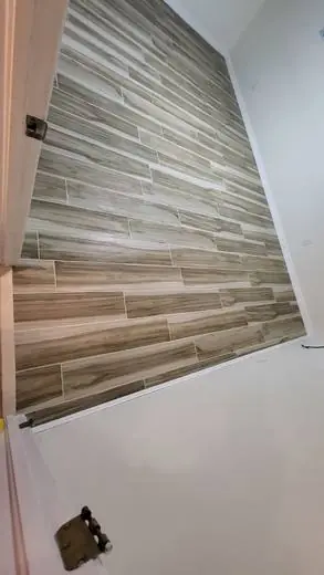 Wood-look tile planks in a staggered pattern