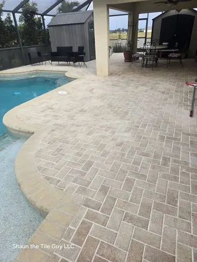 Paver pool deck after cleaning and sealing