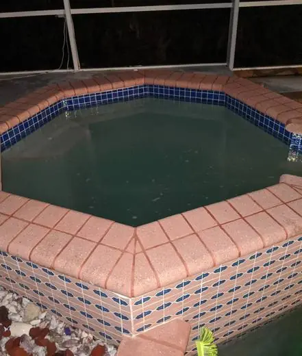 Octagon spa with tile band and coping